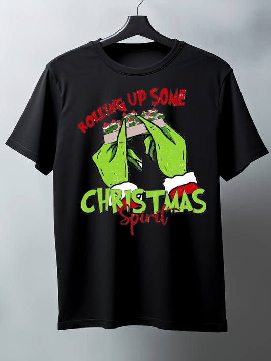 Black t-shirt with green hands and text on a hanger against a gray background