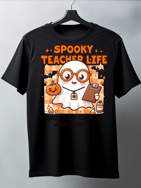 Black t-shirt with 'Spooky Teacher Life' graphic on a hanger against a gray background